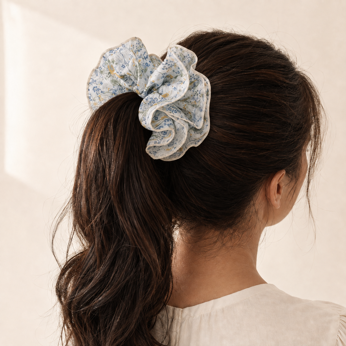 Morning Meadow floral chiffon scrunchie styled in a ponytail