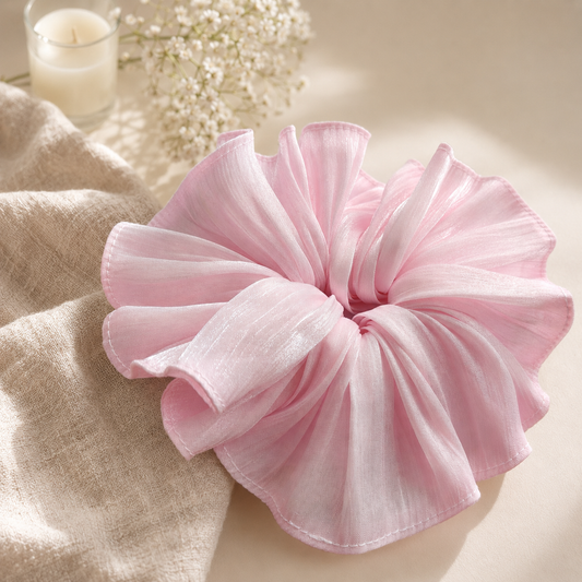 Blush pink oversized shimmer ruffle scrunchie in natural sunlight by Luna Dot
