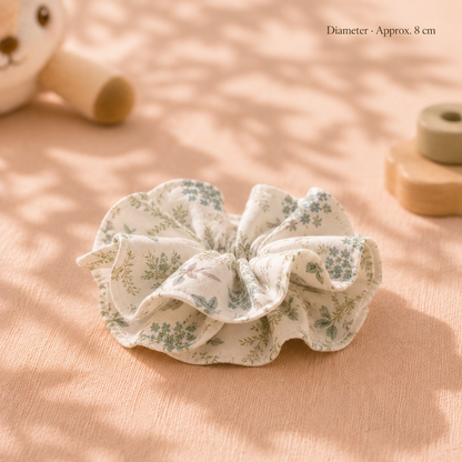 Green Meadow green botanical cotton scrunchie measuring approximately 8 cm