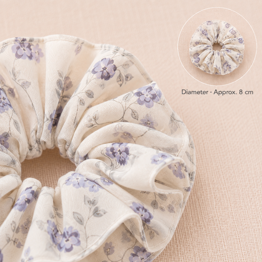 Misty Bloom warm ivory and soft purple floral cotton scrunchie measuring approximately 8 cm